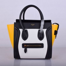 Bolso tote mediano Celine negro, blanco y amarillo.