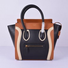 Bolso tote mediano Celine Luggage en negro, marrón y blanco.