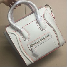 Bolso tote mediano Celine Luggage en color beige y naranja.