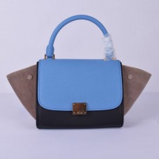 Bolso Celine Small Trapeze de ante azul, negro y caqui.