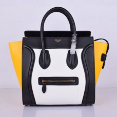 Bolso tote grande Celine en negro, blanco y amarillo.