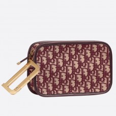Bolso de mano Dior Diorquake en color burdeos. Lona Dior Oblique.