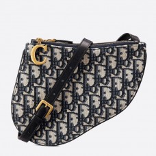 Bolso Dior Saddle Trio con correa en lona azul oblicua.