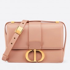 Bolso de hombro Dior 30 Montaigne en piel de becerro rosa pálido.