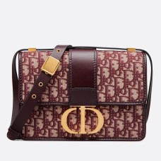 Bolso Dior 30 Montaigne en lona jacquard oblicua color burdeos.