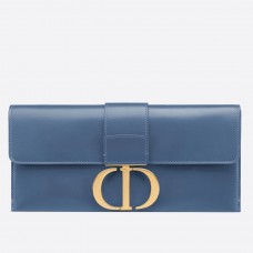 Bolso de mano Dior 30 Montaigne en piel de becerro azul vaquero.