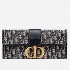 Bolso de mano Dior 30 Montaigne en lona azul oblicua.