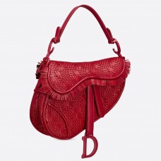 Bolso Saddle de Dior en tiras de cuero trenzado rojo con flecos.