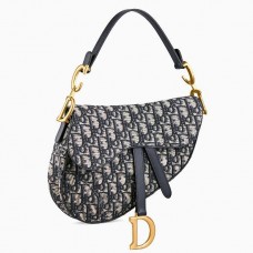 Bolso Saddle de Dior en lona jacquard oblicua azul.