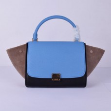 Bolso Celine Medium Trapeze de ante azul, negro y caqui.